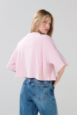 Camiseta rosada oversize crop top con arte de Lilo y Stitch