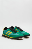 Tenis casuales verdes con suelas planas y contrastes