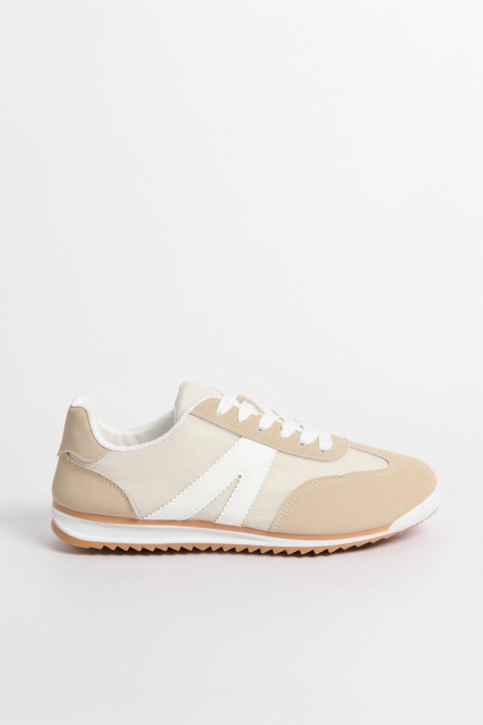 Tenis casuales unicolores con diseños laterales en contraste