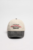 Gorra beisbolera color crema sin refuerzo, sistema de cierre trabilla y con bordado de "The Authentics: Four Caribbeans".