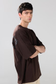 Camiseta oversize manga corta unicolor con diseño posterior