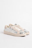 Zapatillas de estilo clásico, suela de caucho natural de perfil bajo.
