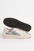 Zapatillas de estilo clásico, suela de caucho natural de perfil bajo.