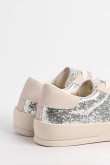 Zapatillas de estilo clásico, suela de caucho natural de perfil bajo.