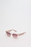 Gafas de sol con marco rectangular crema y lentes esfumados en contraste.