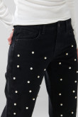 Jean negro straight low waist con perlas y tiro bajo