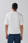 Camiseta manga corta crema con diseño de escultura