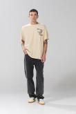 Camiseta manga corta oversize unicolor con textos estampados