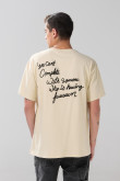 Camiseta manga corta oversize unicolor con textos estampados