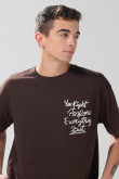 Camiseta manga corta oversize unicolor con textos estampados