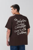 Camiseta manga corta oversize unicolor con textos estampados