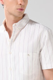 Camisa unicolor en algodón cuello button down a rayas
