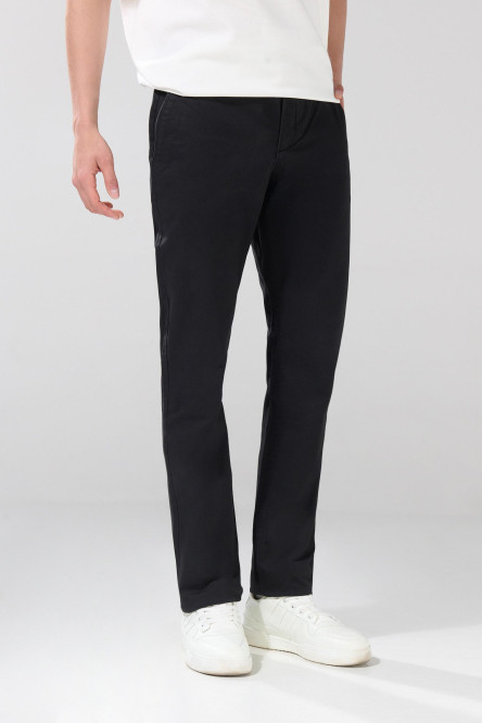 Pantalón tiro medio unicolor slim en dril con bolsillos