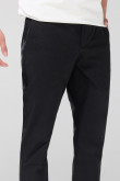Pantalón tiro medio unicolor slim en dril con bolsillos