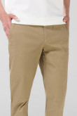 Pantalón tiro medio unicolor slim en dril con bolsillos