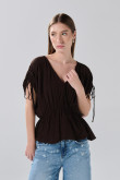 Blusa unicolor con elástico en cintura y manga larga