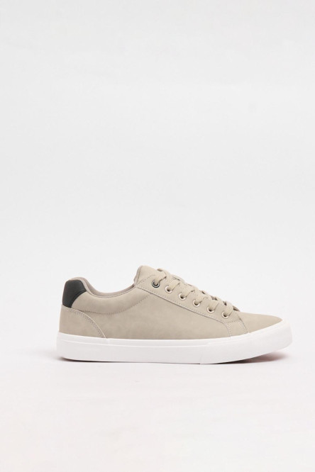 Tenis unicolores casuales con suelas en contraste planas