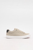 Tenis unicolores casuales con suelas en contraste planas