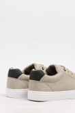 Tenis unicolores casuales con suelas en contraste planas
