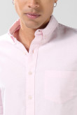 Camisa unicolor en algodón con cuello button down