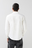 Camisa unicolor en algodón con cuello button down