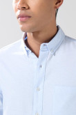Camisa unicolor en algodón con cuello button down