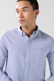Camisa unicolor en algodón con cuello button down