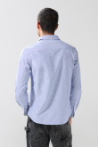 Camisa unicolor en algodón con cuello button down