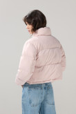 Chaqueta cuello alto unicolor con bolsillos acolchada