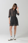 Vestido corto negro con puntos estampados y cinturón