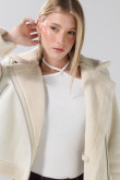 Chaqueta unicolor biker con cierre cruzado y efecto sherpa