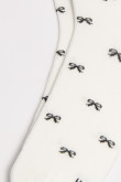 Medias unicolores largas con diseños de moños