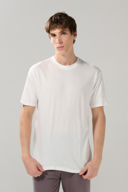 Camiseta unicolor manga corta con hombro rodado en algodón