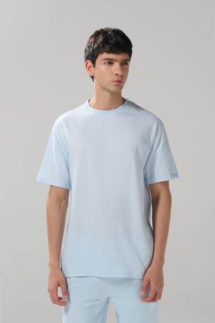 Camiseta unicolor manga corta con hombro rodado en algodón