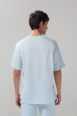 Camiseta unicolor manga corta con hombro rodado en algodón