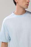 Camiseta unicolor manga corta con hombro rodado en algodón