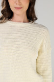 Suéter unicolor cuello redondo con texturas localizadas